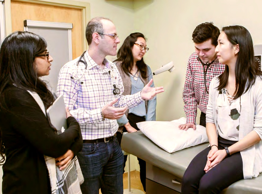 Michener Institute trainees in a clinical setting.